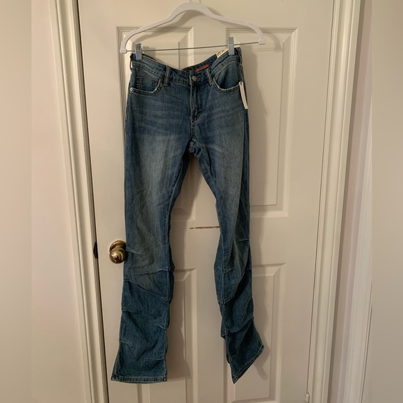 Low rise icon flare mid wash jeans by Anthropologie. - Picture 1 of 4